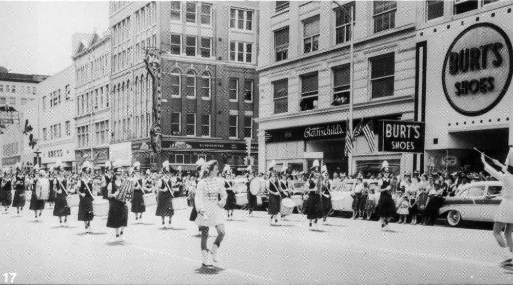 (CHS.2011.01.29) - Central High School Band Marching in Parade through Intersection of Main and Harvey, c. late 1950s 
