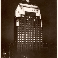 (FNB.2010.16.11) - First National Building Illuminated at Night, View Southeast possibly from Fidelity Bank Tower, c. late 1950s