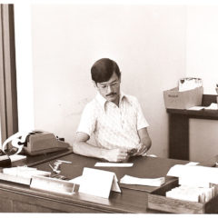 (FNB.2010.12.32) - Jim Morgan, Parking Garage Office, First National Center, c. 1970