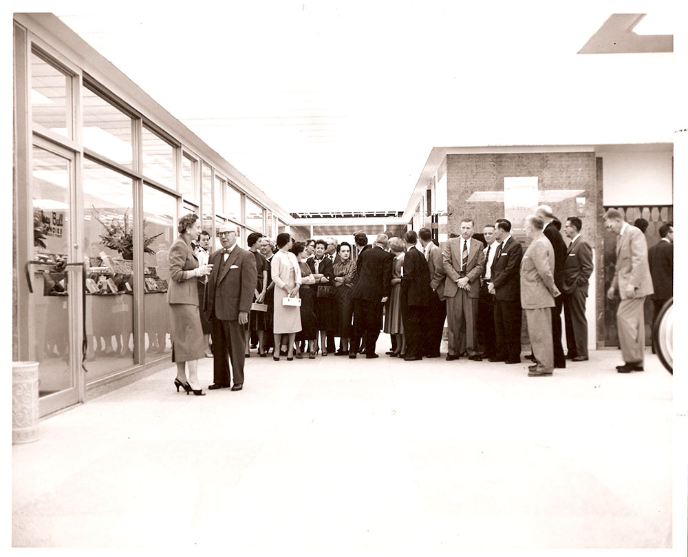 (FNB.2010.12.37) - Crowd in the Arcade of Fine Shops, First National Center, c. 1970