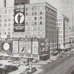 (HTC.2010.1.03) - Hightower Building, 105 N Hudson, View East on Main from the Harbour-Longmire Building, c. early 1950s