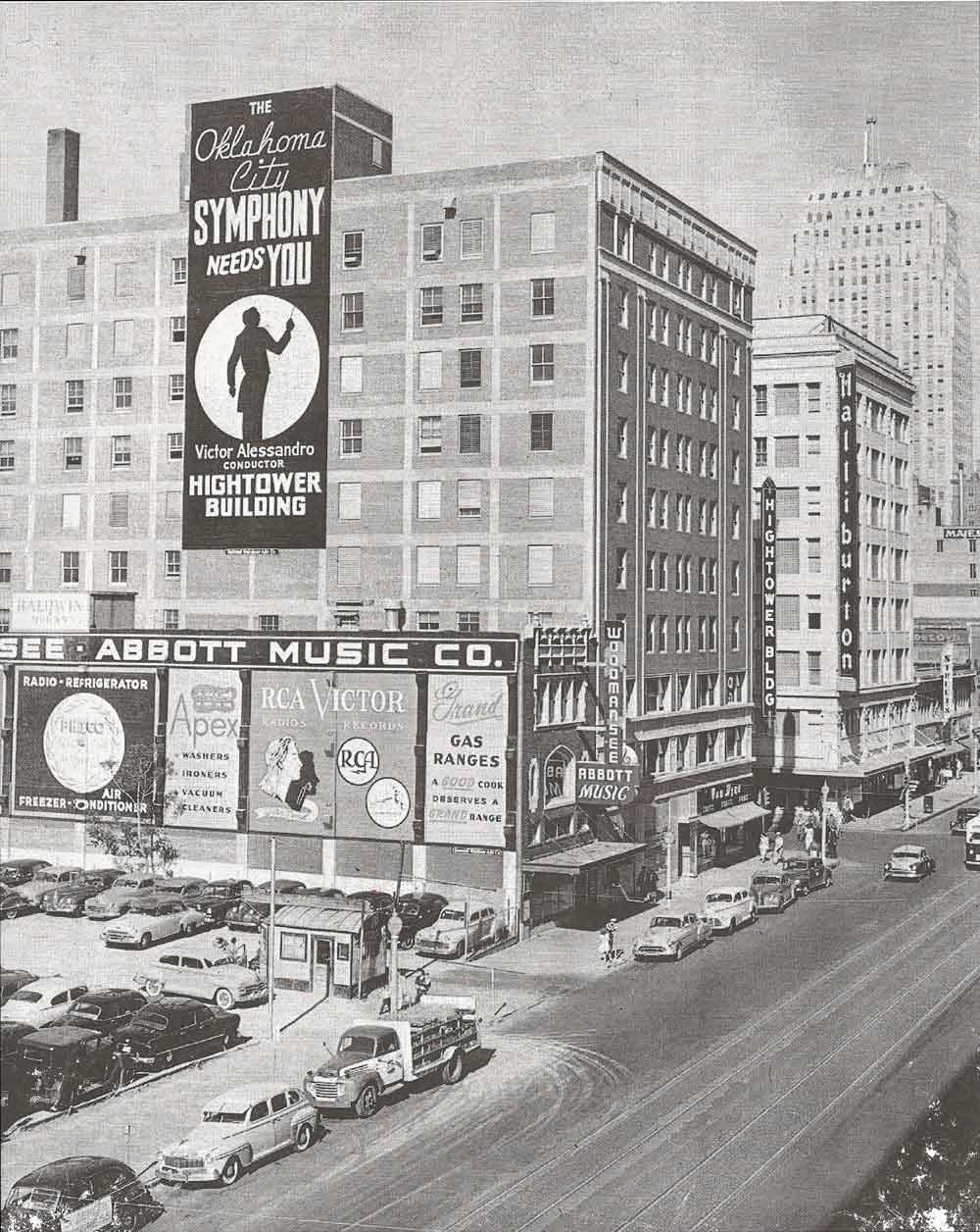 (HTC.2010.1.03) - Hightower Building, 105 N Hudson, View East on Main from the Harbour-Longmire Building, c. early 1950s