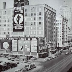 (HTC.2010.1.05) - Hightower Building, 105 N Hudson, View East on Main from the Harbour-Longmire Building, c. early 1950s