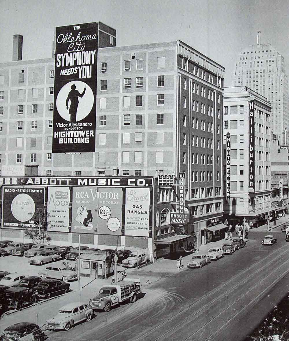 (HTC.2010.1.05) - Hightower Building, 105 N Hudson, View East on Main from the Harbour-Longmire Building, c. early 1950s