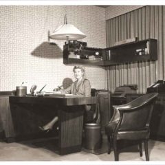 (HTC.2010.3.01) - Secretary in Office, Hightower Building, 105 N Hudson, c. 1950s