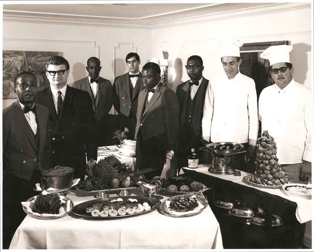 (HTC.2010.5.05) - Staff including Chef John Bennett (second left), The Cellar Restaurant, Basement, Hightower Building, 105 N Hudson, 1970s