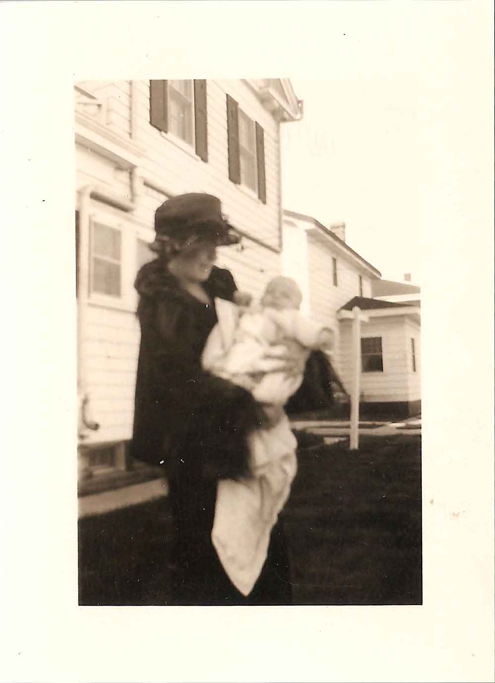 (HTC.2010.8.09) - Woman Holding Infant (possibly Ethelyn Hightower at 409 NW 21), c. 1920s