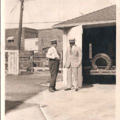 (HTC.2010.8.12) - Two Men Converse near a Garage, c. 1920s