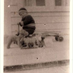 (HTC.2010.8.16) - Frank Hightower with Toys, c. 1920s
