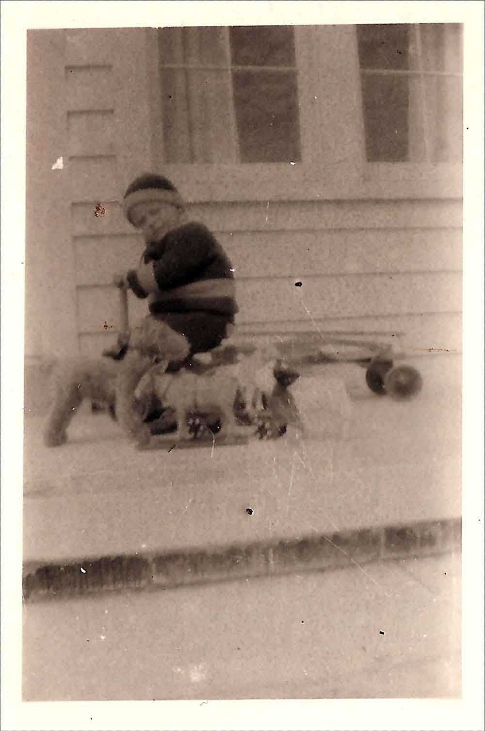 (HTC.2010.8.16) - Frank Hightower with Toys, c. 1920s