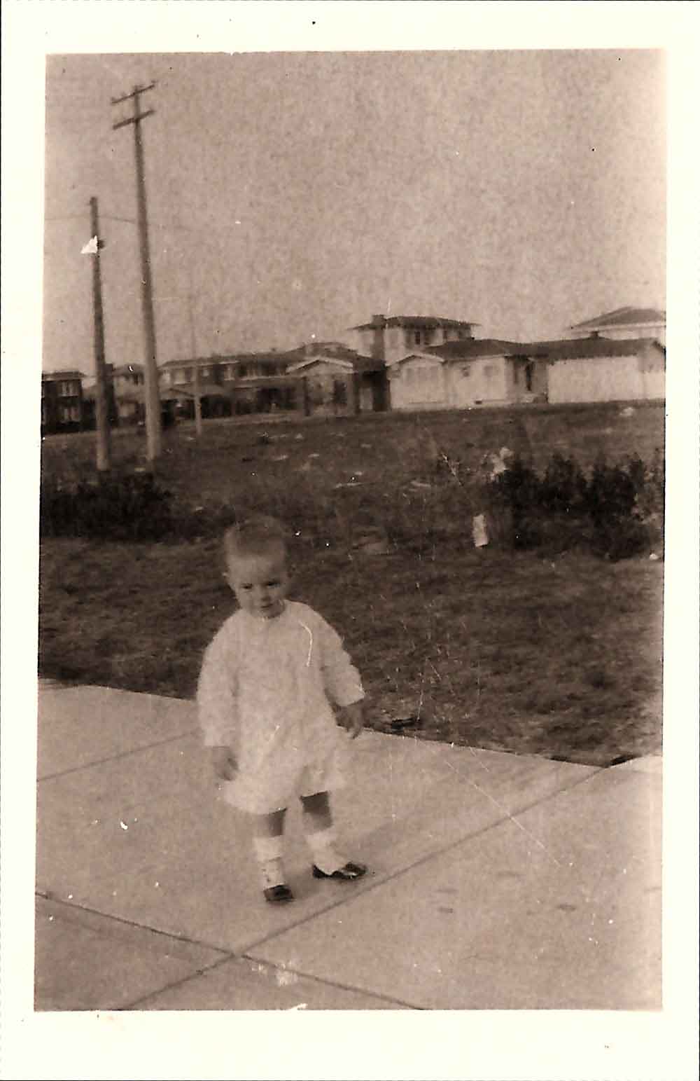 (HTC.2010.8.17) - Hightower Child (probably Frank) on the Drive of 409 NW 21, View Northeast of 300 Block of NW 22, c. 1926