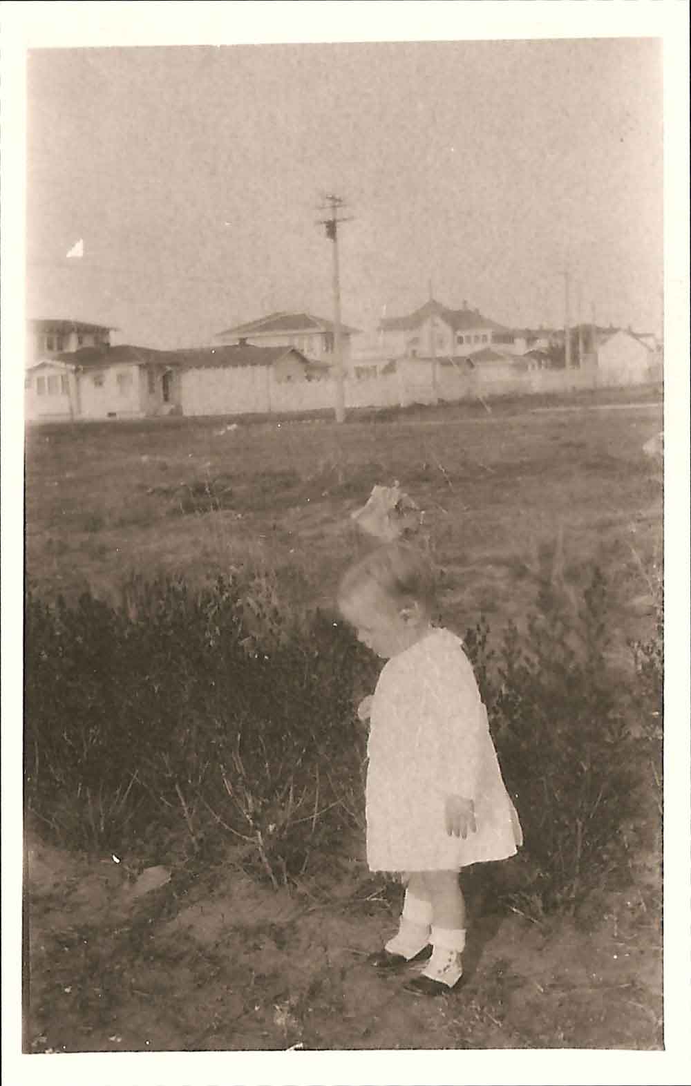(HTC.2010.8.19) - Hightower Child (probably Frank) on the Drive of 409 NW 21, View Northeast of 300 Block of NW 22, c. 1926