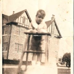 (HTC.2010.8.33) - Frank Hightower on Lawn of 409 NW 21 (2203 N Hudson in background), c. 1927