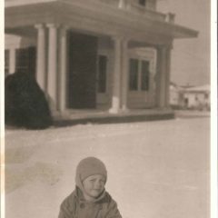 (HTC.2010.8.34) - Child (probably Frank Hightower) Sledding in Front of the Keene C. Burwell Home, 415 NW 21, c. 1926