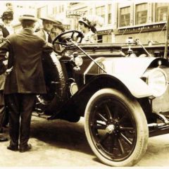 (HTC.2010.8.41) - Frank Johnson at the Wheel of a 1913 Chalmers Model 18 Automobile in 200 Block of W Main, c. 1913