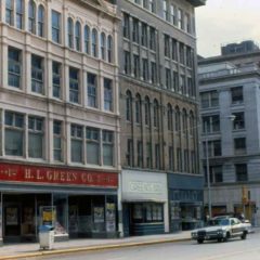 (KMC.2011.1.06) - View Southwest of Southeast Corner of Main and Harvey, c.1975