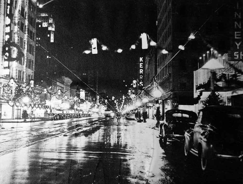 (OMC.2012.1.13) - Night View East on Main from Hudson, c. 1940s