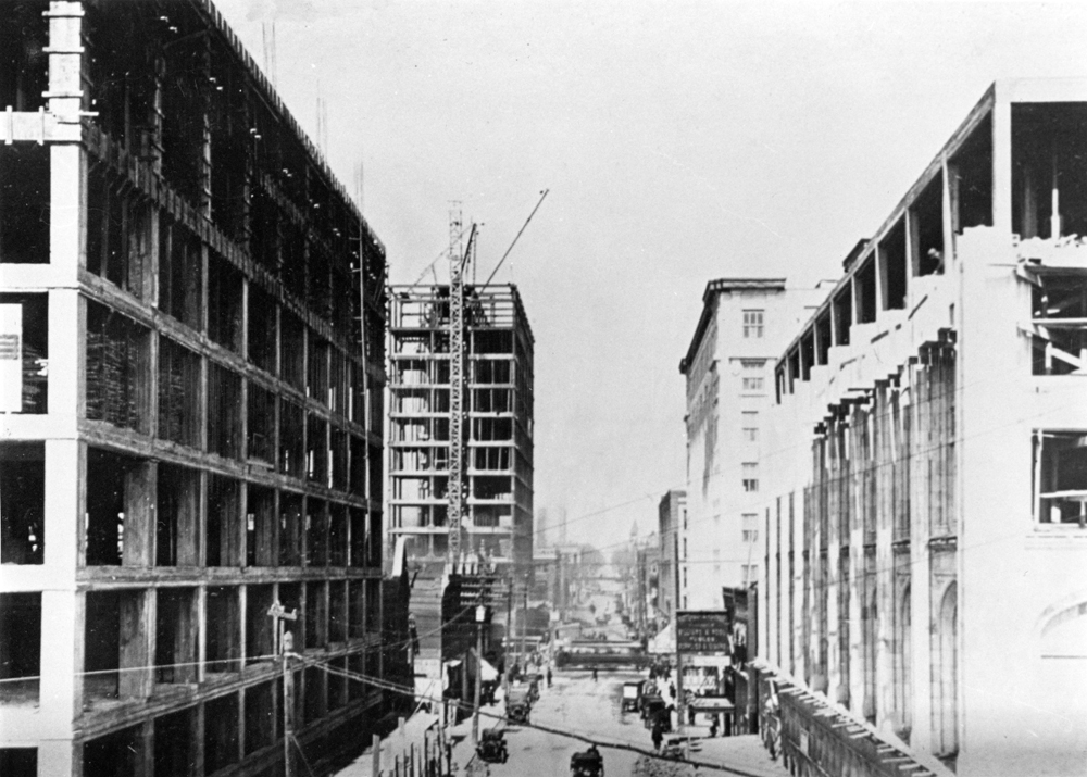 (CHS.2011.01.70) - Three Buildings under Construction, View N on Robinson Ave from Grand, c. 1909