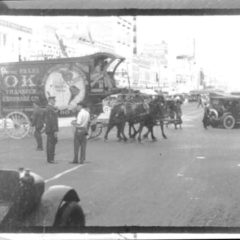 (RAC.2010.02.14) - Looking East on Main from Robinson (still from 35mm newsreel,