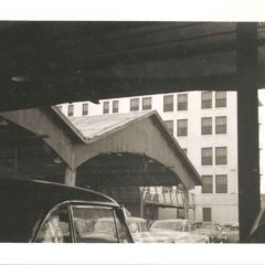 (RAC.2010.07.39) - Terminal Building Parking Lot, View West toward rear of Hudson Hotel, c. 1950s