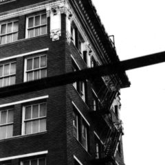(RAC.2010.07.63) - Looking Up at Rear (North Side) of Globe Life Building, 311-17 W Sheridan, c. 1968