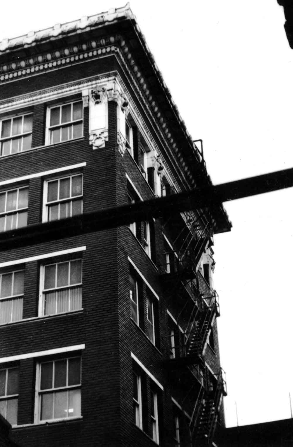 (RAC.2010.07.63) - Looking Up at Rear (North Side) of Globe Life Building, 311-17 W Sheridan, c. 1968
