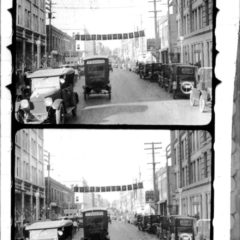 (RAC.2010.07.82) - View North on Robinson from Main, stills from 35mm newsreel,