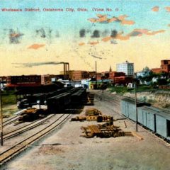 (RACp.2010.18.11) - Rock Island Railyard, Warehouse District, View West, postmarked 6 Jul 1909