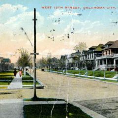 (RACp.2010.25.23) - View West on NW 12 from Harvey, postmarked 12 Oct 1913