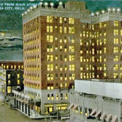 (RACp.2010.35.62) - View North on Broadway from Main at Night, postmarked 29 Dec 1913