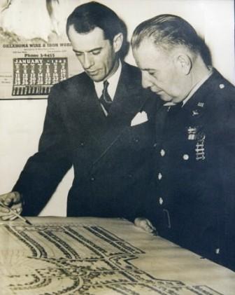 Bill Atkinson and Commander Turnbull review plans for Midwest City. Photos courtesy of the Atkinson Center.