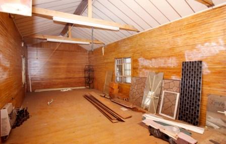 Although much of 2418 Guernsey has been stripped down, traces of the old gym can still be seen on the second floor.